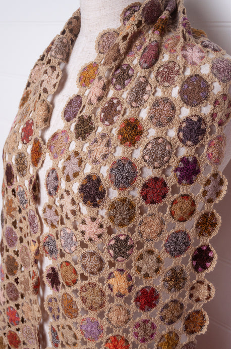 Sophie Digard crochet wool scarf floral medallions in warm earthy tones.