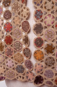 Sophie Digard crochet wool scarf floral medallions in warm earthy tones.