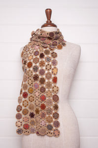 Sophie Digard crochet wool scarf floral medallions in warm earthy tones.