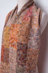 Sophie Digard crochet wool scarf tiny squares forming larger patches of earthy tones.