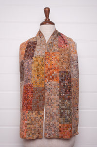 Sophie Digard crochet wool scarf tiny squares forming larger patches of earthy tones.