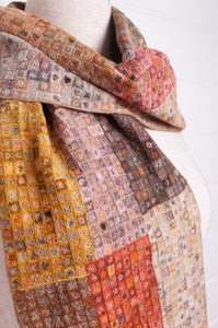 Sophie Digard crochet wool scarf tiny squares forming larger patches of earthy tones.