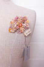 Load image into Gallery viewer, Sophie Digard crocheted flower brooch in warm neutral tones.