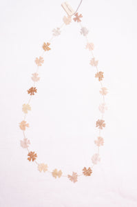 Sophie Digard fine crochet flower necklace in natural tones.