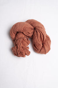 Linen gauze scarf in soft moccha brown.