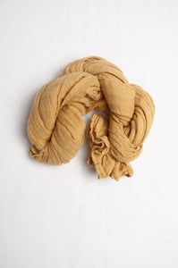 Pure linen gauze scarf in light mustard yellow.