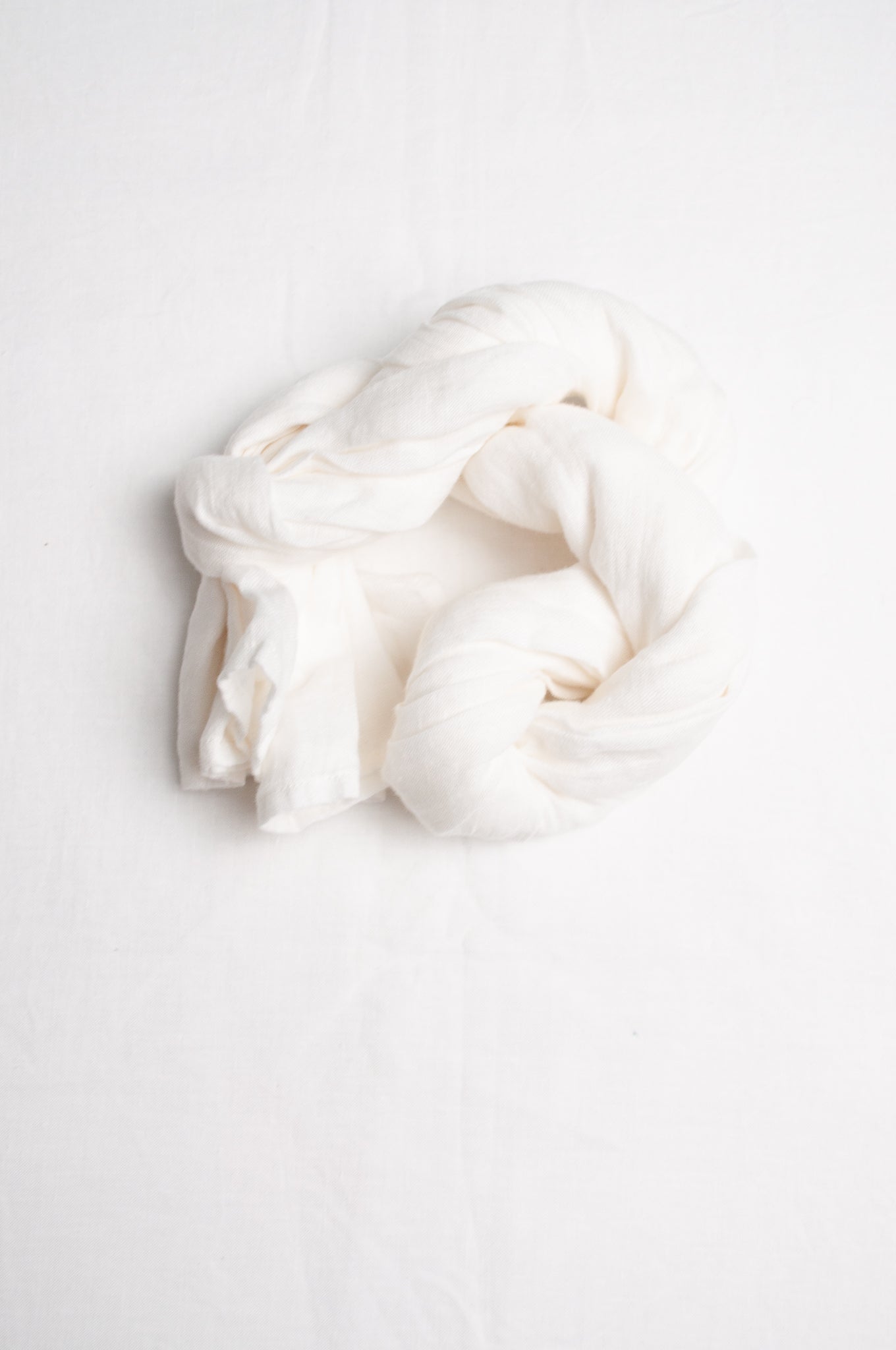 White linen gauze scarf.