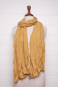 Pure linen gauze scarf in light mustard yellow.