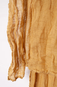 Pure linen gauze scarf in light mustard yellow.