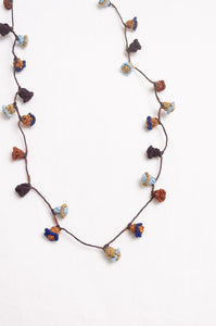 Hand made Moroccan button necklace blues and browns.