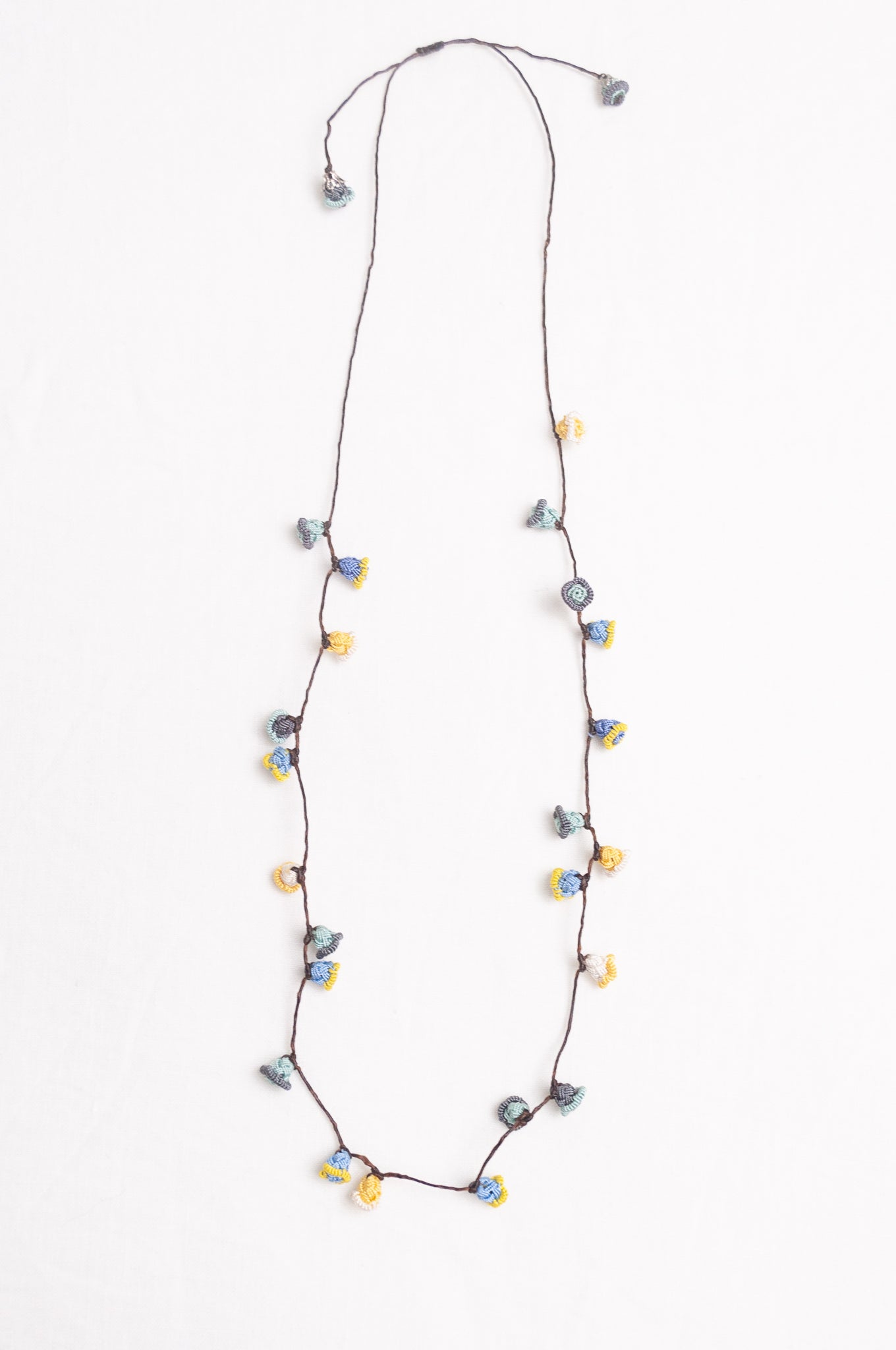 Hand made Moroccan button necklace sky blue and yellow.