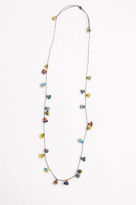 Hand made Moroccan button necklace greens yellows and aqua.