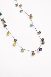 Hand made Moroccan button necklace greens yellows and aqua.