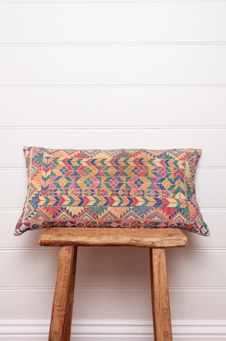 Vintage cross stitch sampler bolster cushion.