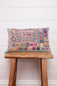 Vintage sampler cross stitch bolster cushion.