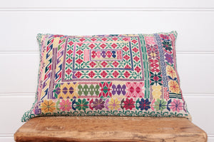 Vintage sampler cross stitch bolster cushion.