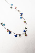 Load image into Gallery viewer, Moroccan flower button necklace in cornflower blues and pink.