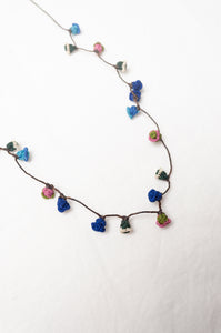 Moroccan flower button necklace in cornflower blues and pink.