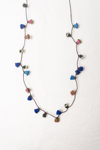 Moroccan flower button necklace in cornflower blues and pink.