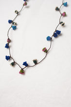 Load image into Gallery viewer, Moroccan flower button necklace in cornflower blues and pink.