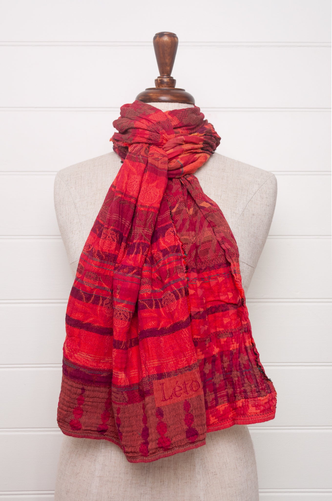 Letol organic cotton jacquard scarf in Ziggy coulis pink and red berry tones.