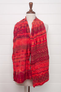 Letol organic cotton jacquard scarf in Ziggy coulis pink and red berry tones.