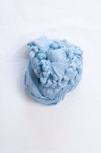 Load image into Gallery viewer, Silk and cotton scarf with pom poms in sky blue.