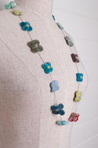 Sophie Digard classic cotton velvet four petal flower necklace in cheerful bright pastels.