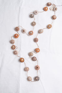 Sophie Digard embroidered linen medallions necklace in warm neutrals.