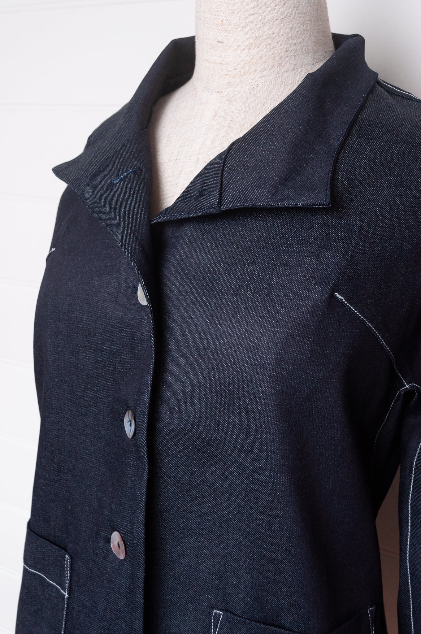Valia Miro jacket in deep denim blue, feature top stitching.