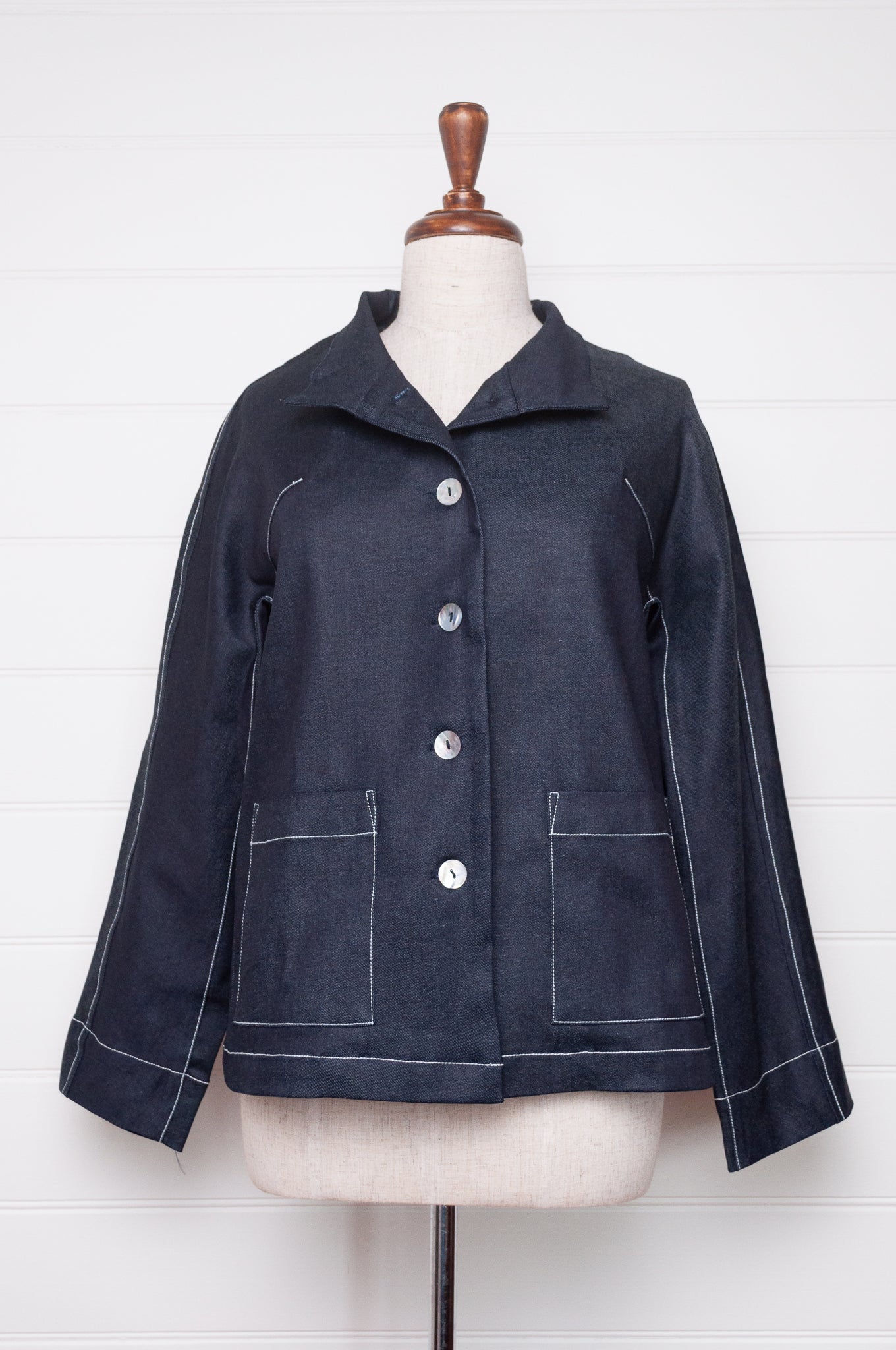 Valia Miro jacket in deep denim blue, feature top stitching.