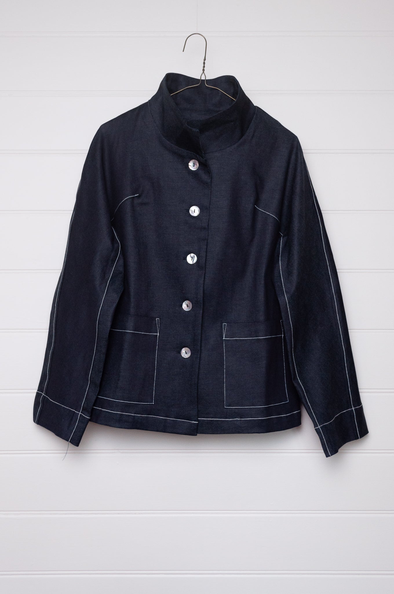 Valia Miro jacket in deep denim blue, feature top stitching.