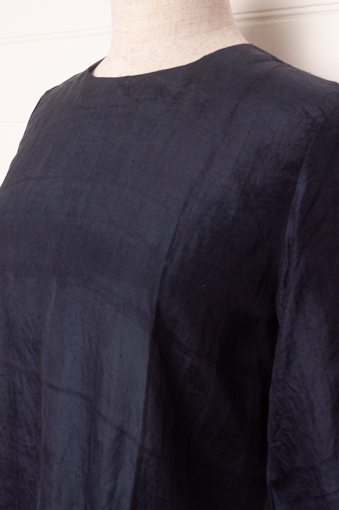 Handloom silk box top with mid length sleeves in ebony black.