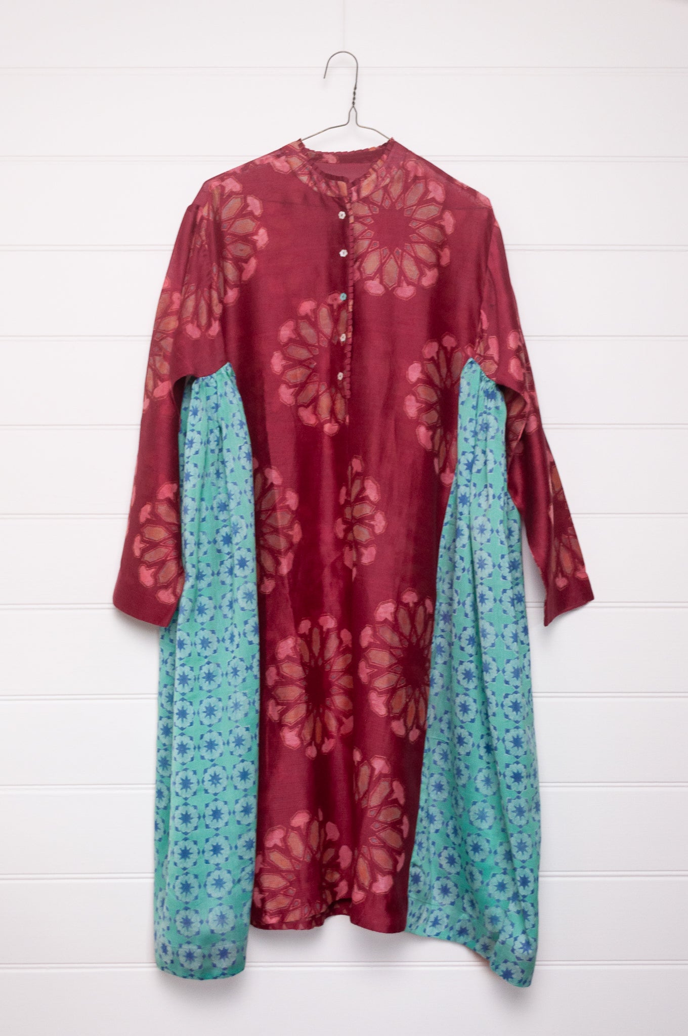 Blockprint cotton silk gathered side panel button up dress. In wine red and aqua blue.