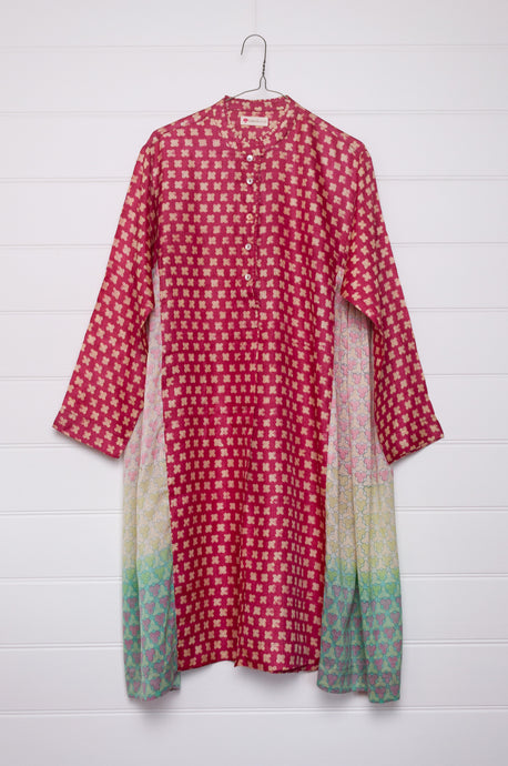 Blockprint tussar and cotton silk button up dress in red with pastel side panels.