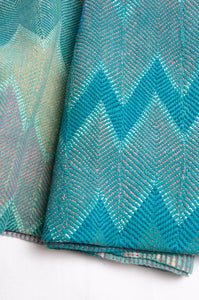 Vintage lohori stitch kantha quilt on aqua blue and green base.