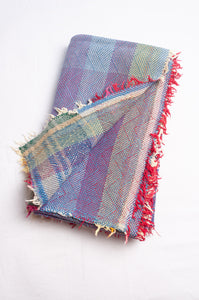 Vintage lohori stitch kantha quilt on multicoloured base.