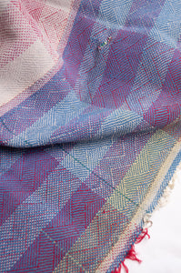 Vintage lohori stitch kantha quilt on multicoloured base.