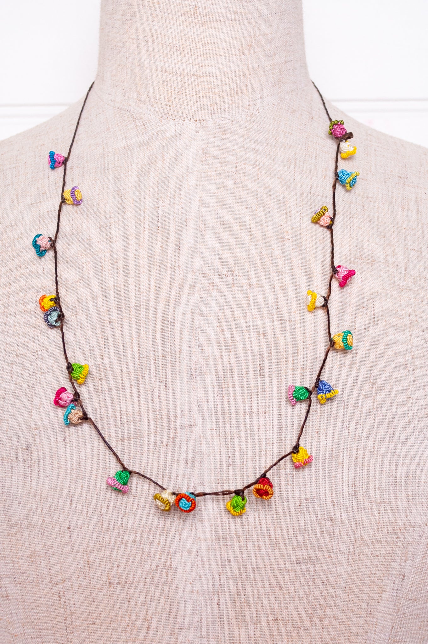 Handmade Moroccan button necklace in  bright pastels.