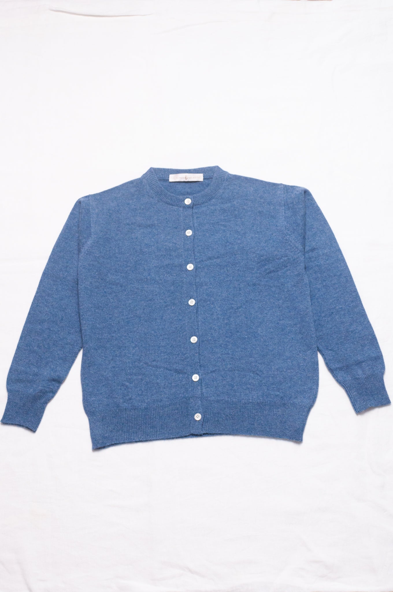 Juniper Hearth classic slimline cashmere cardigan in denim blue.