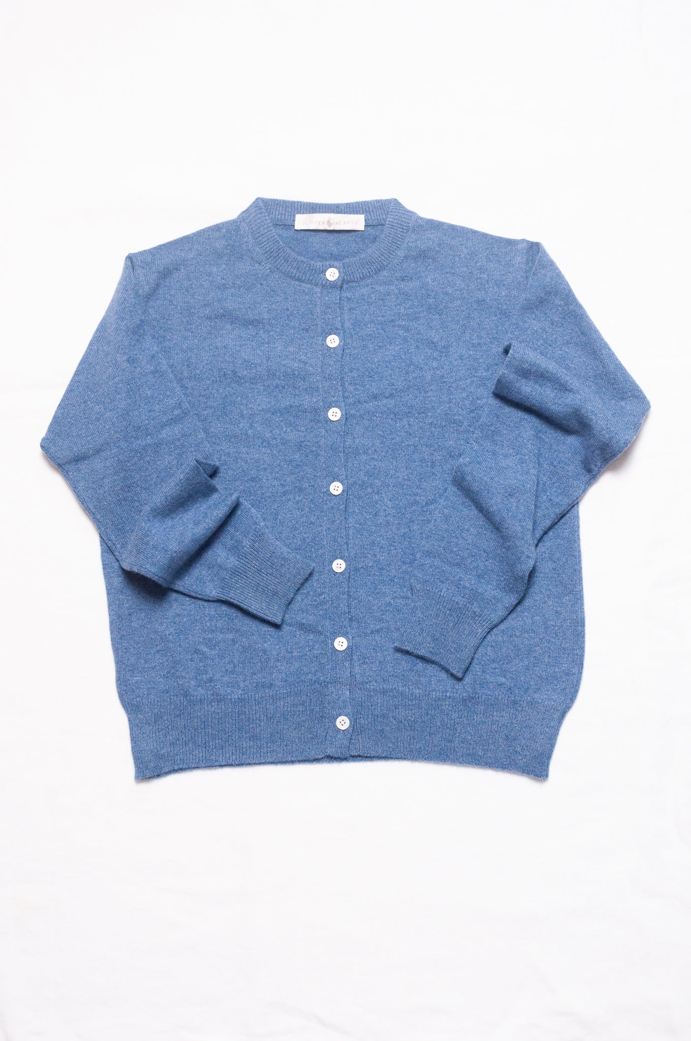 Juniper Hearth classic slimline cashmere cardigan in denim blue.