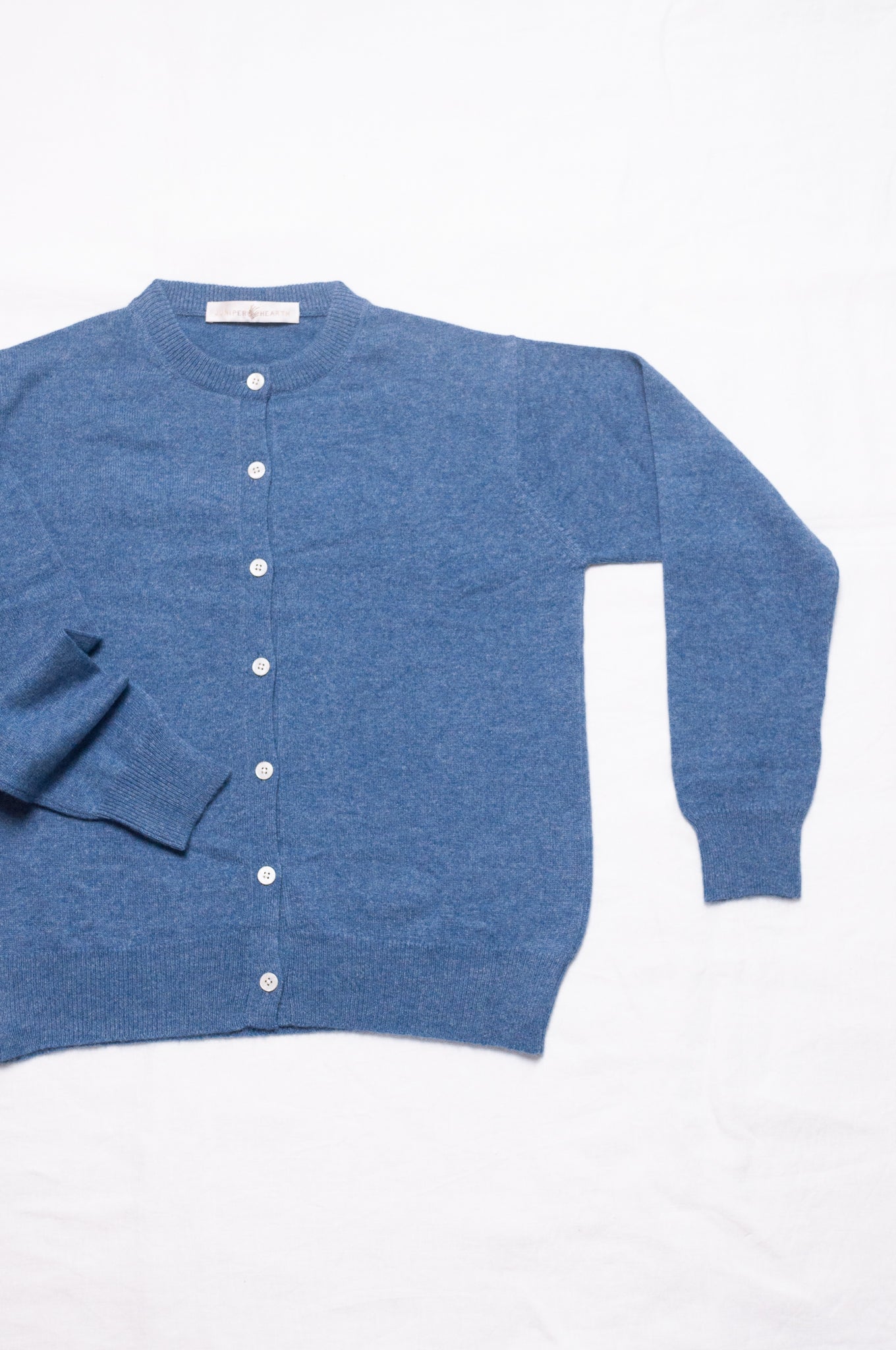 Juniper Hearth classic slimline cashmere cardigan in denim blue.