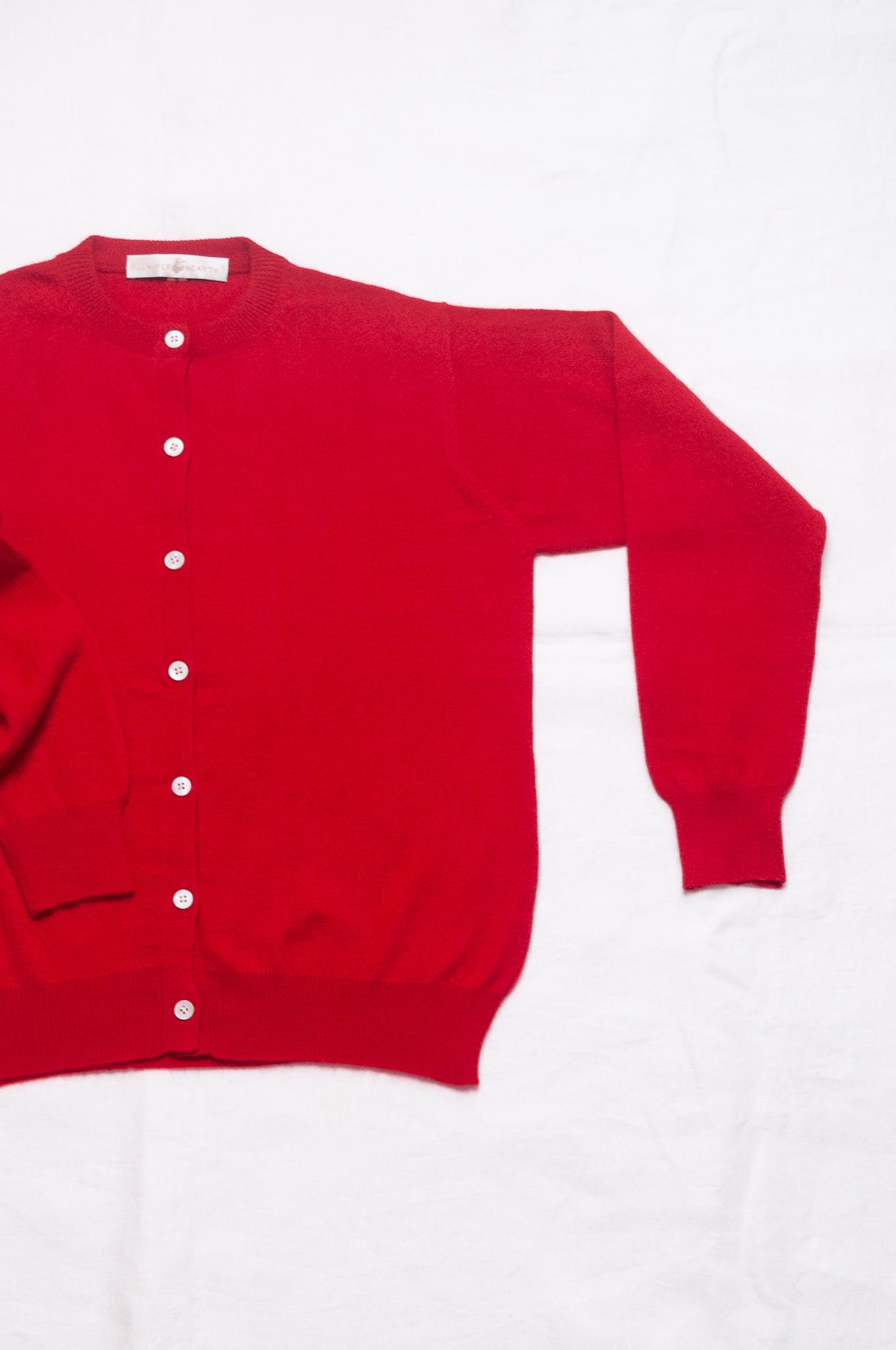 Juniper Hearth classic slimline cashmere cardigan in scarlet red.