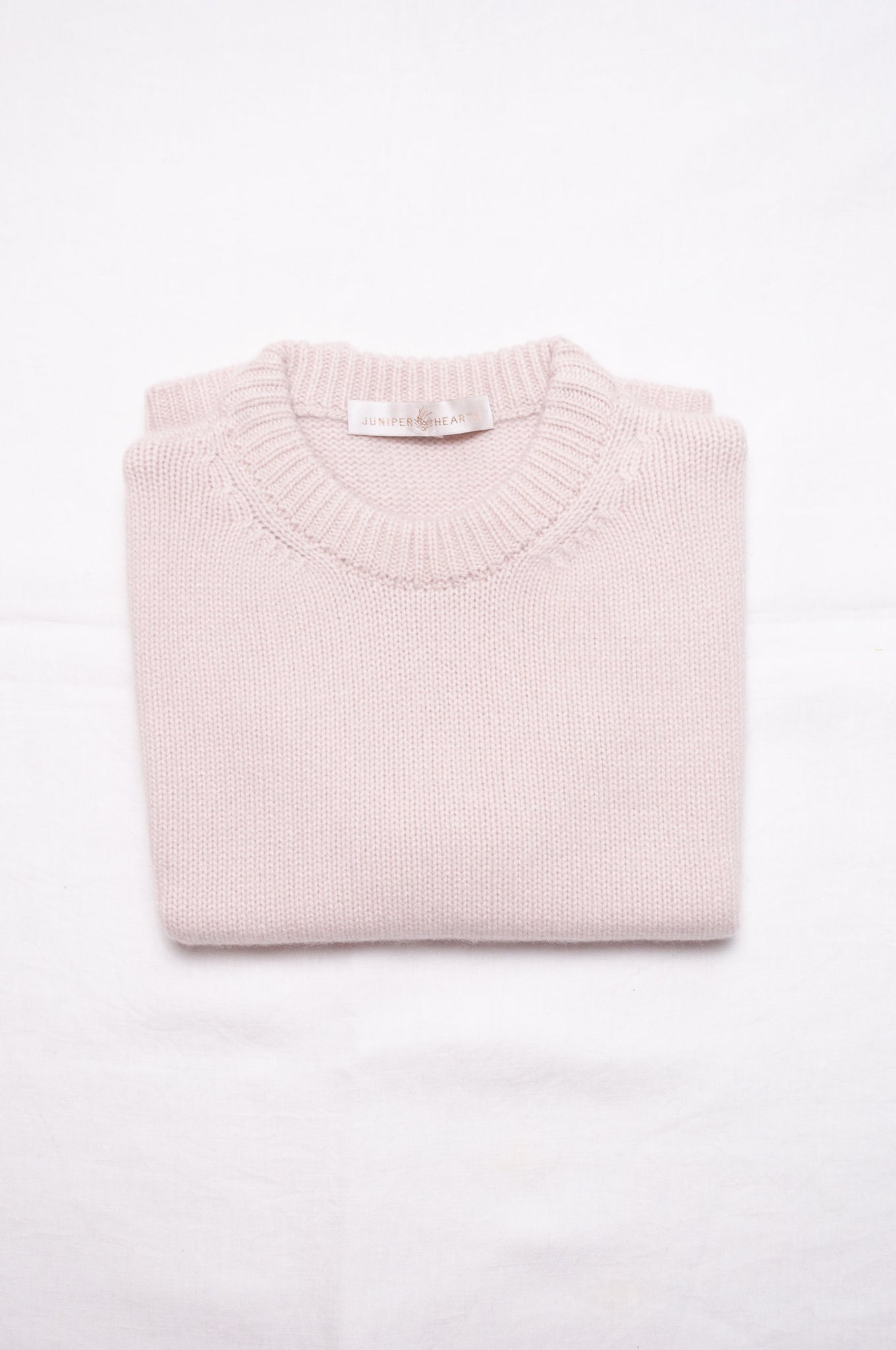 Juniper Hearth cashmere vest in ecru cream.