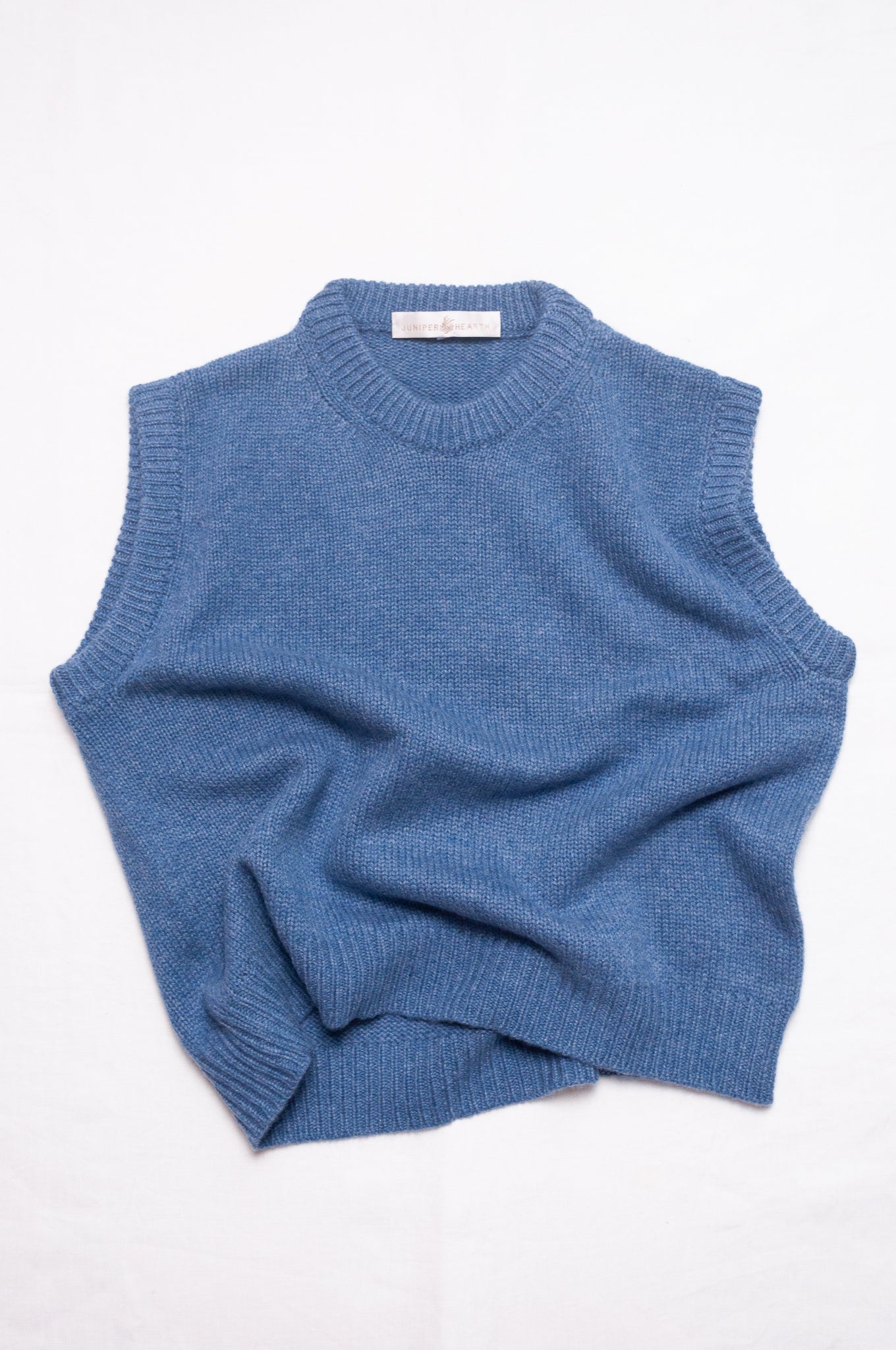 Juniper Hearth cashmere vest in denim blue.
