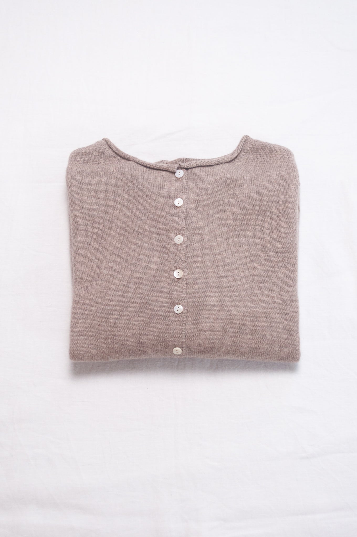 One size reversible pure cashere cardi sweater in biscuit beige.