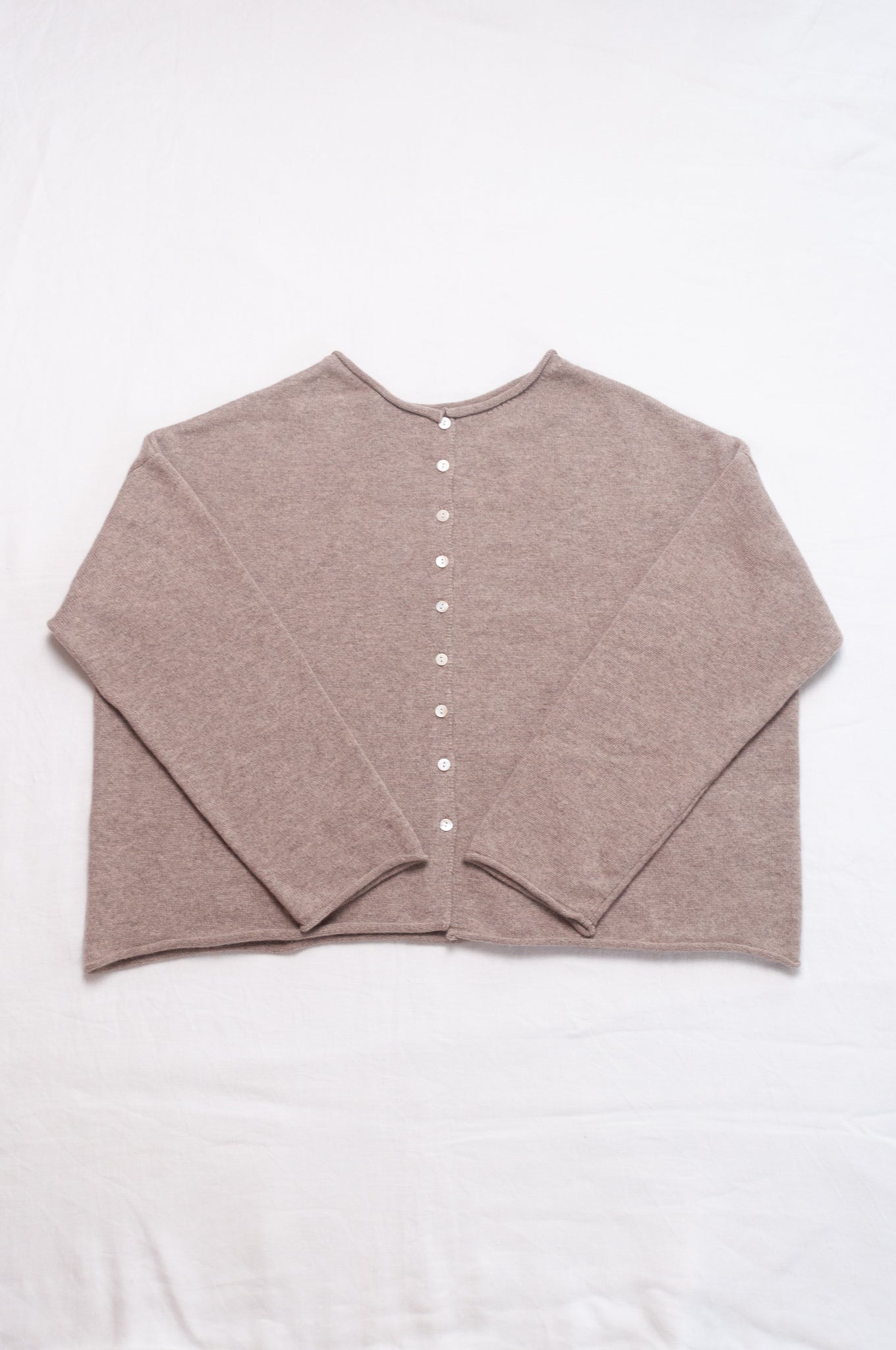 One size reversible pure cashere cardi sweater in biscuit beige.