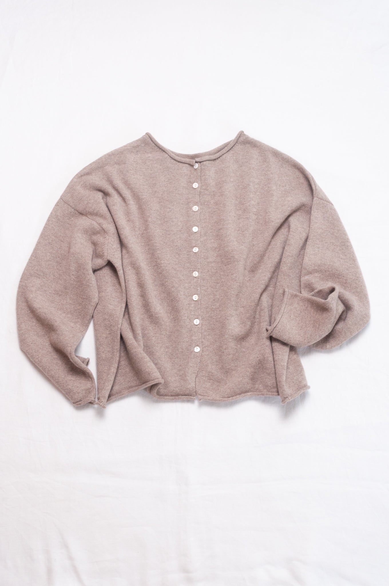 One size reversible pure cashere cardi sweater in biscuit beige.