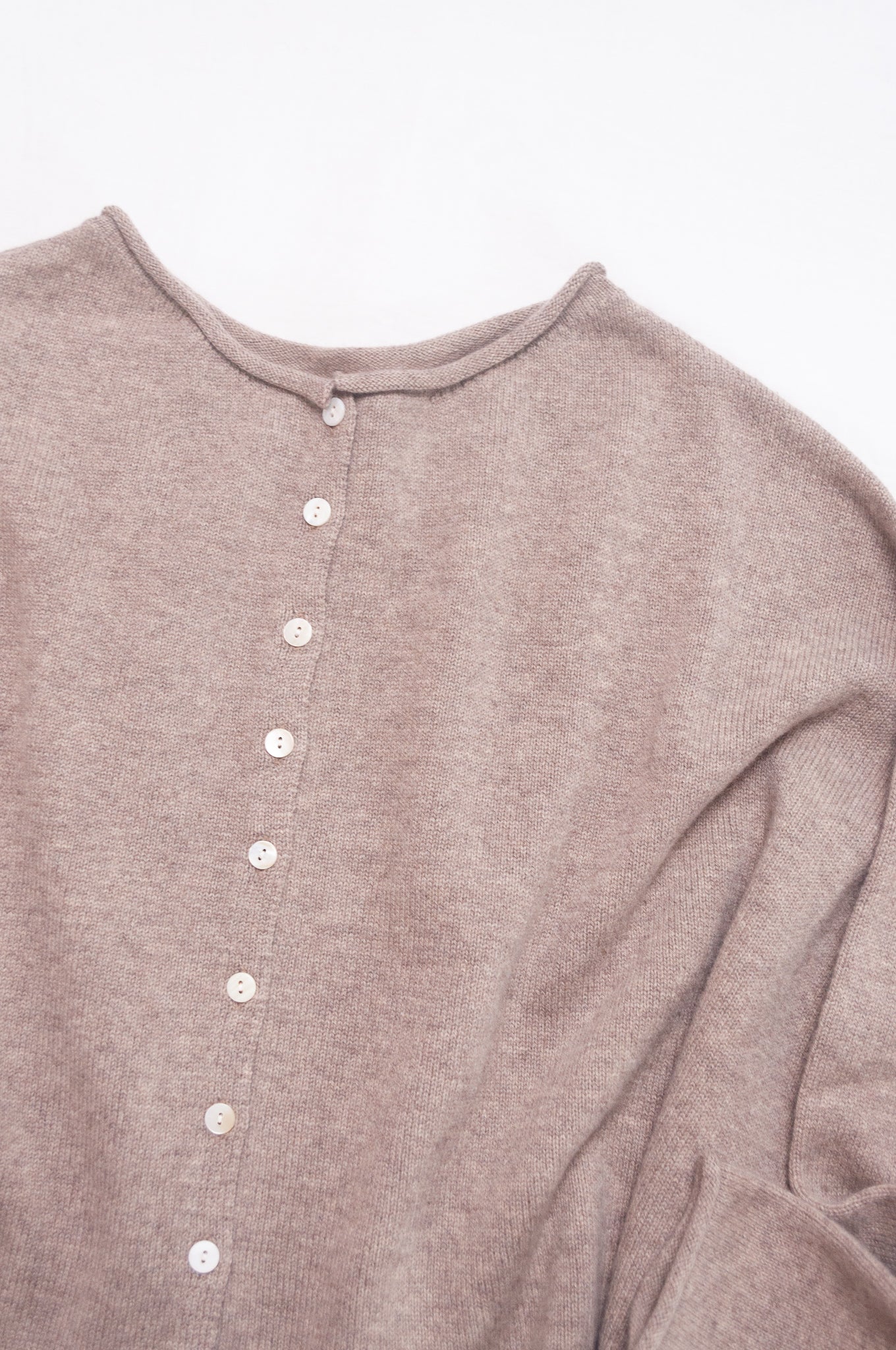 One size reversible pure cashere cardi sweater in biscuit beige.