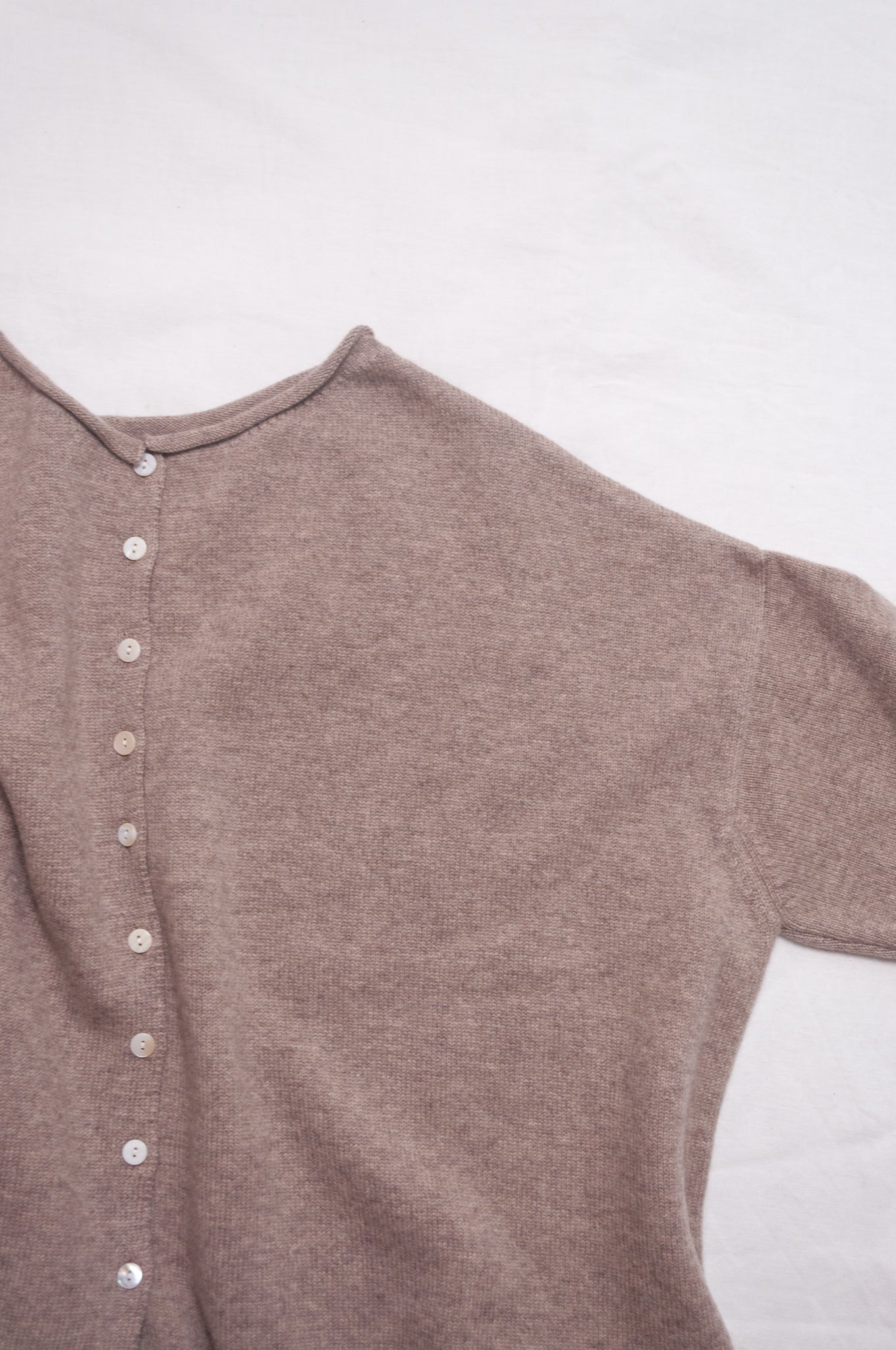 One size reversible pure cashere cardi sweater in biscuit beige.
